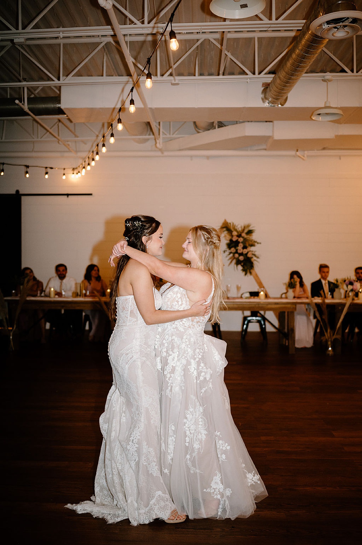 Two women share their first dance after beautiful Indianapolis wedding shot by Indigo Lace Collective