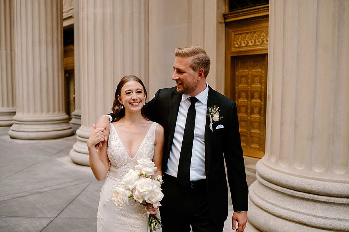 bride and groom smile after ceremony shot in chicago by midwest wedding photographer
