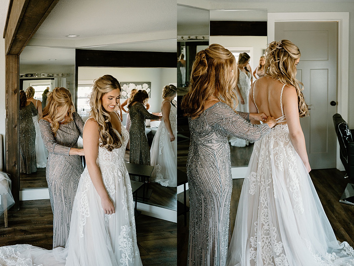 mother of the bride zips up wedding gown for her daughter before good vibes summer wedding at union 12
