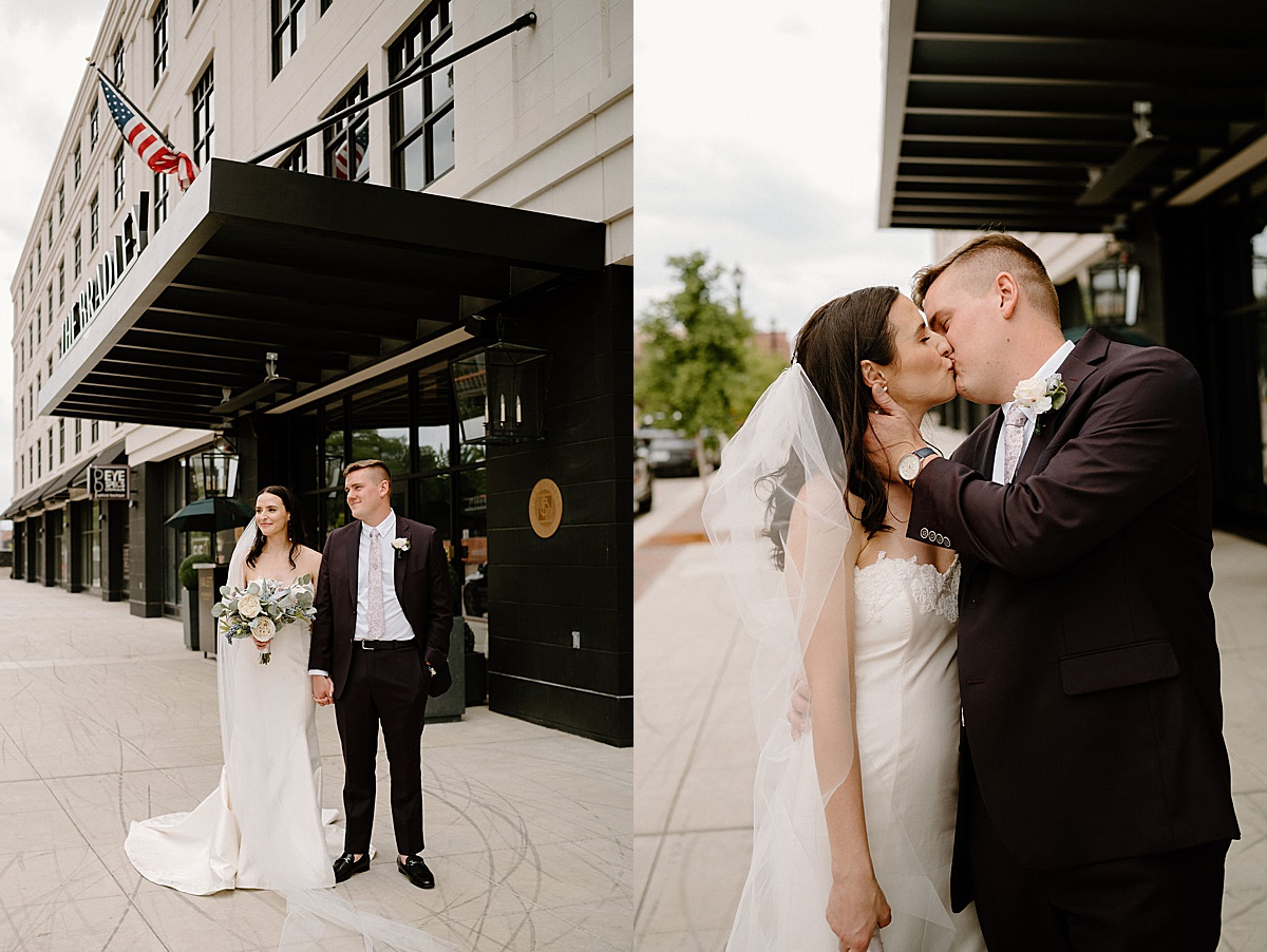 newlywed bride and groom kiss in front of elegant architectural hotel shot by midwest wedding photographer