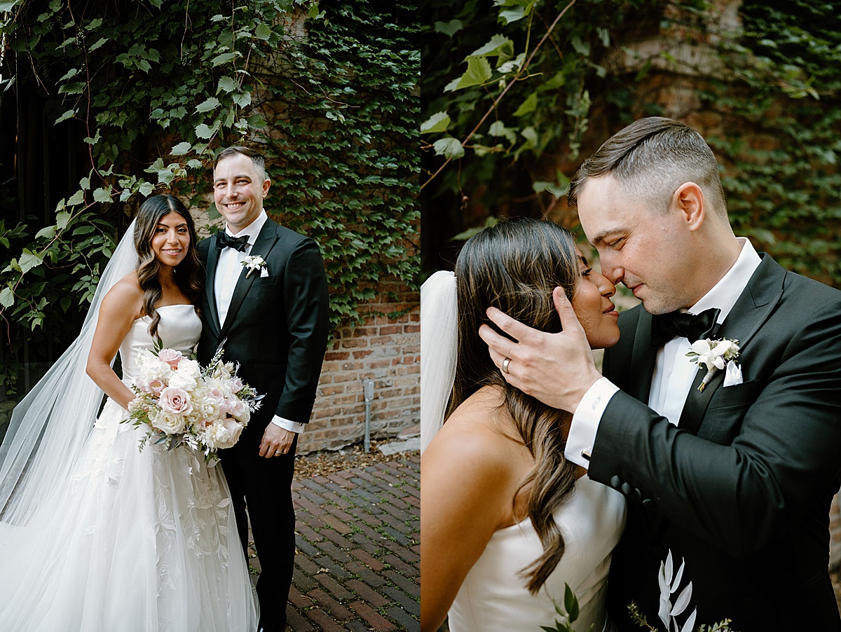 bride and groom pose in front of ivy covered brick wall shot by Chicago wedding photographer