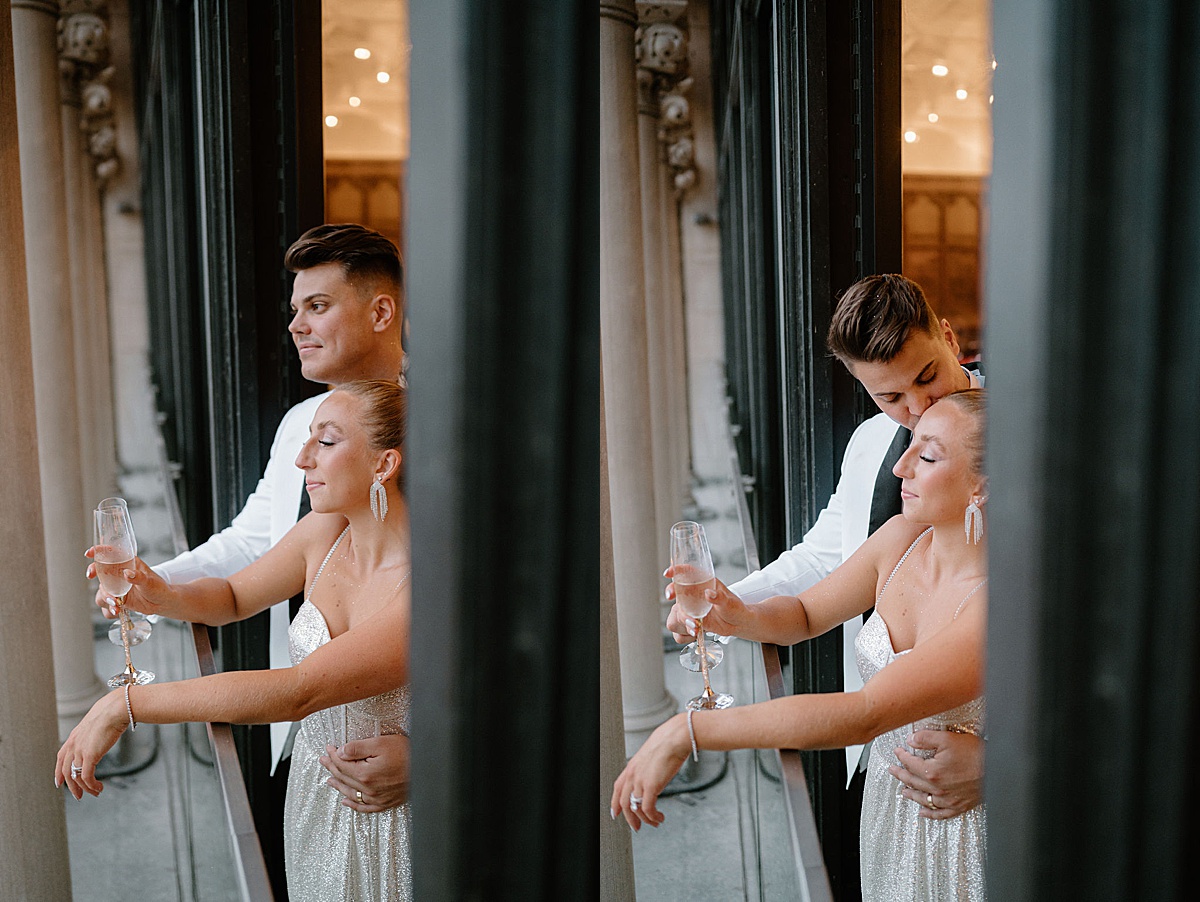 bride and groom sip champagne on balcony after ceremony shot by Indigo Lace Collective