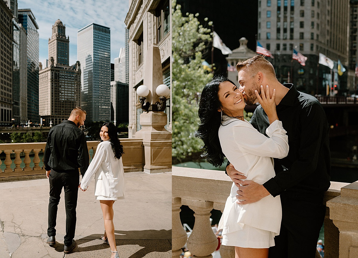 woman in shite blazer holds hands with handsome guy during big city engagement session