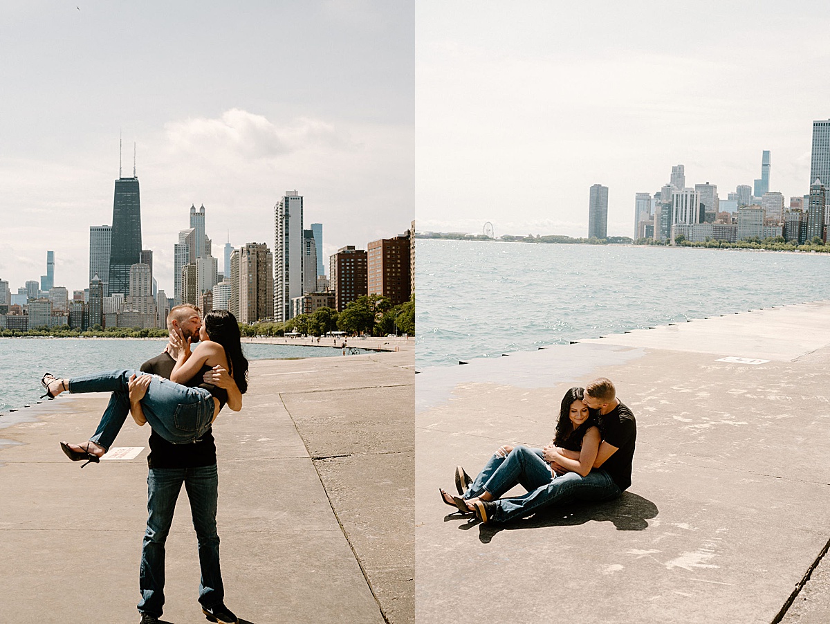 young couple in love pose playfully on city pier during engagement shoot with Indigo Lace Collective