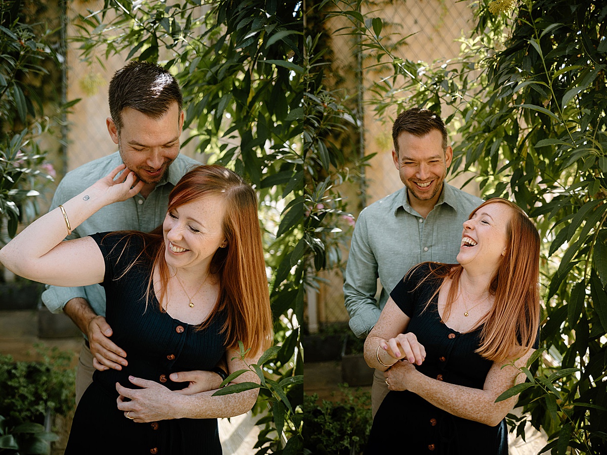 Cute engaged couple pose in old English greenhouse during garden session with Indigo Lace Collective