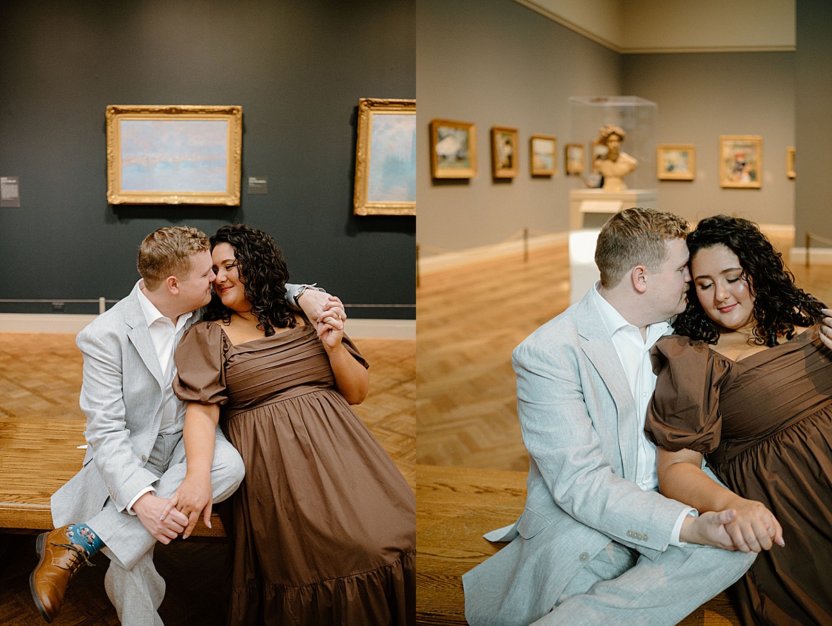 romantic couple pose in art museum during sweet engagement shoot by Indigo Lace Collective