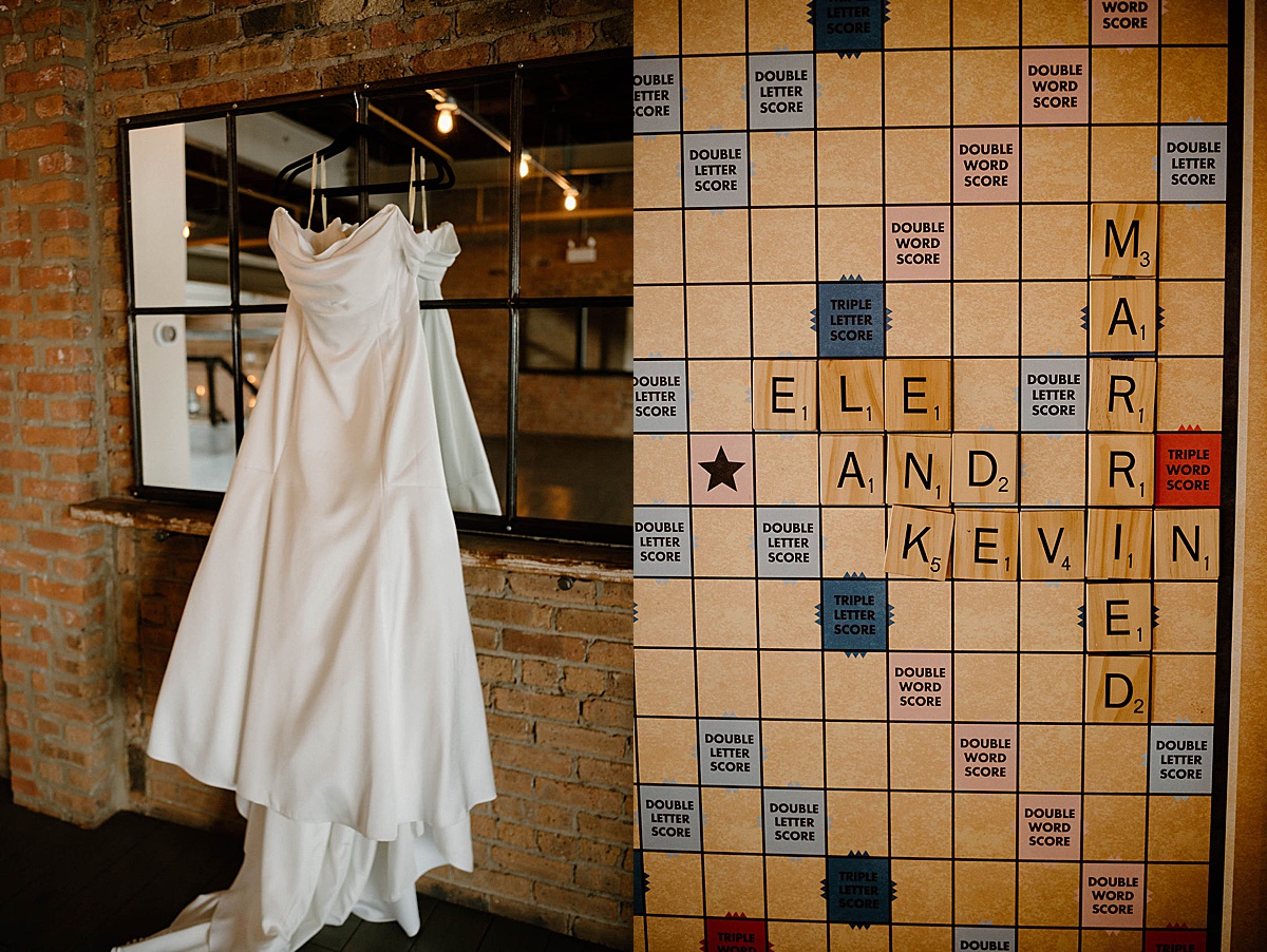 bride's gown hangs ready before romantic winter celebration while a cute message is spelled out on scrabble board