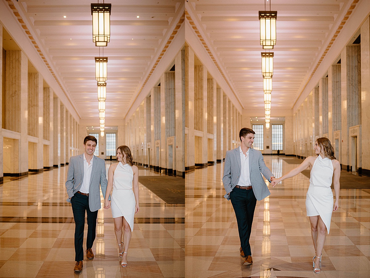 engaged couple walk hand in hand through marble hall during shoot with Chicago wedding photographer