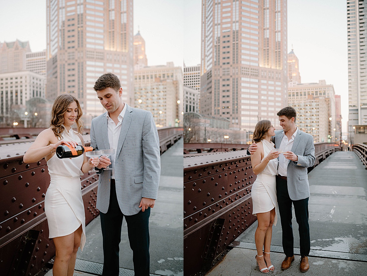 midwest couple pour champagne on Chicago bridge after engagement photos with Indigo Lace Collective