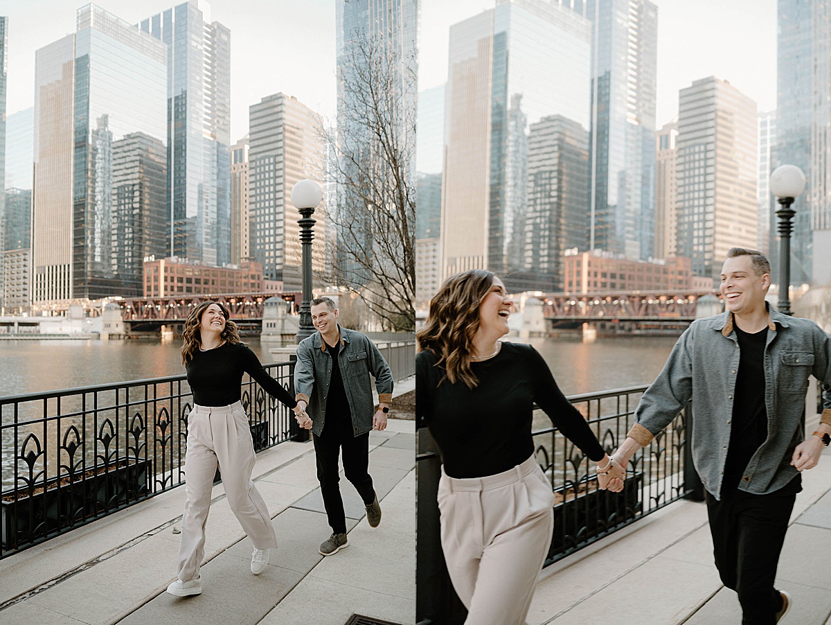 couple in cute modern clothes run along Chicago waterfront during engagement shoot with Indigo Lace Collective