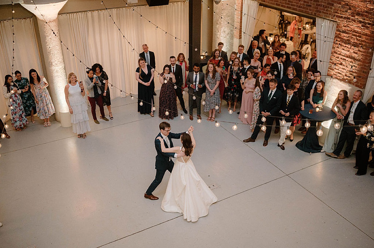 arial shot of bride and groom sharing a first dance at reception shot by Chicago Wedding photographer