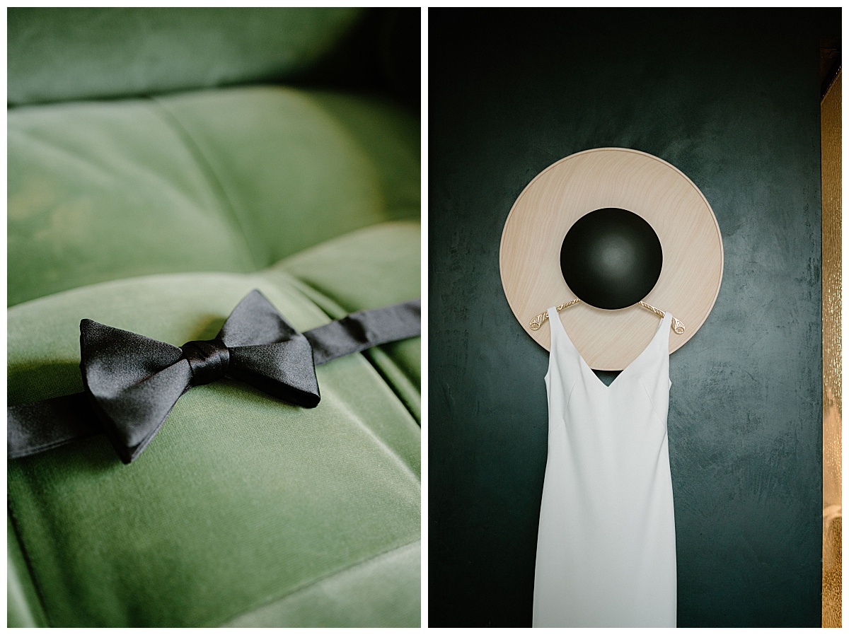 bow tie sits on couch and gown hangs on wall by Midwest wedding photographer