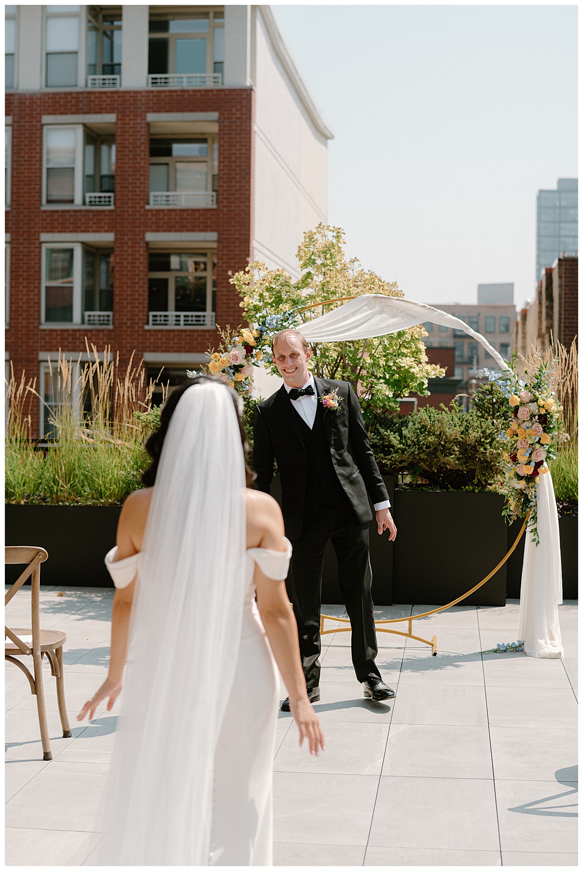 groom sees bride for the first time at ceremony location by Indigo Lace Collective