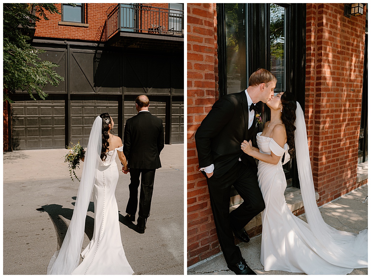 couple holds hands and kisses at Lacuna Lofts
