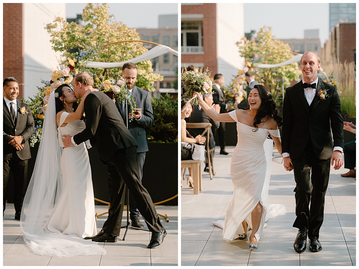 newlyweds seal vows with a kiss and smile at guests by  Indigo Lace Collective