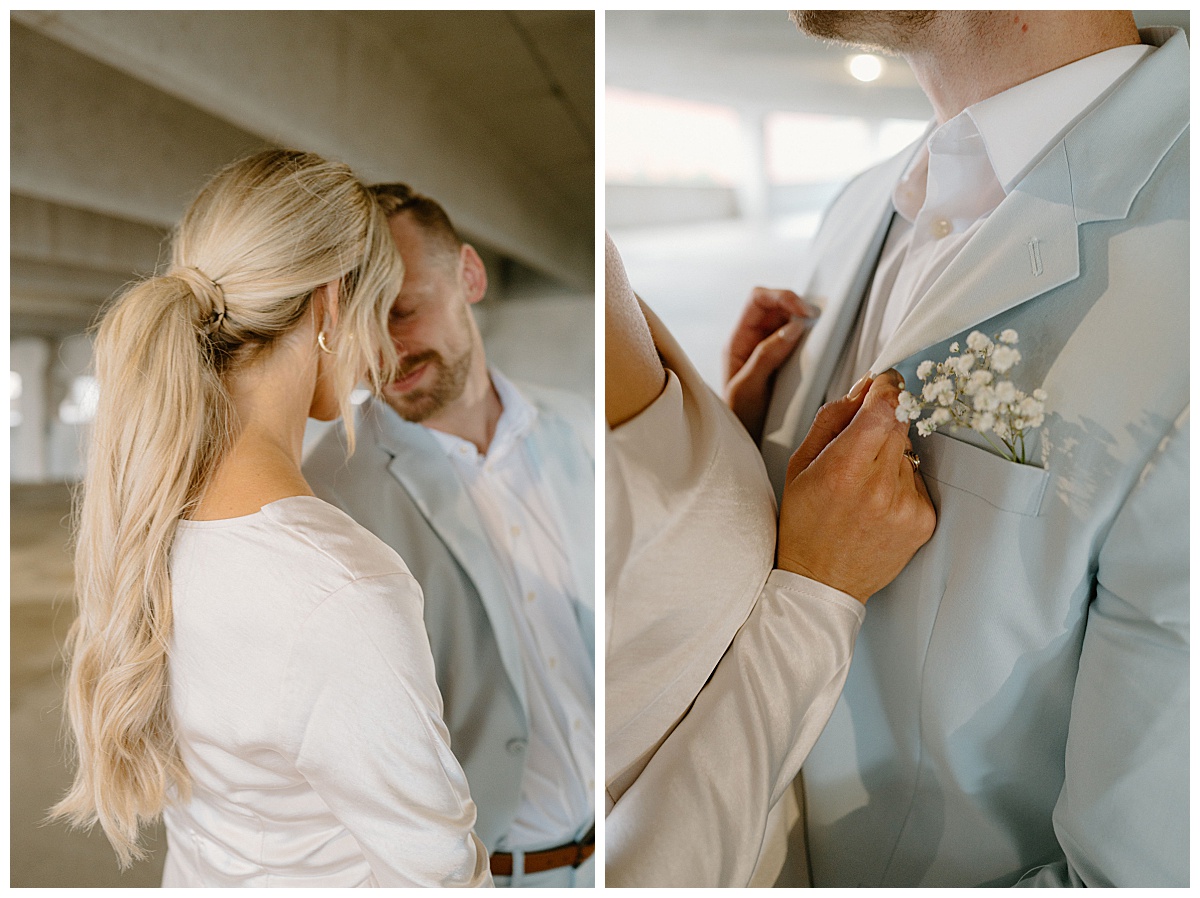 bride holds grooms lapels by Indigo Lace Collective