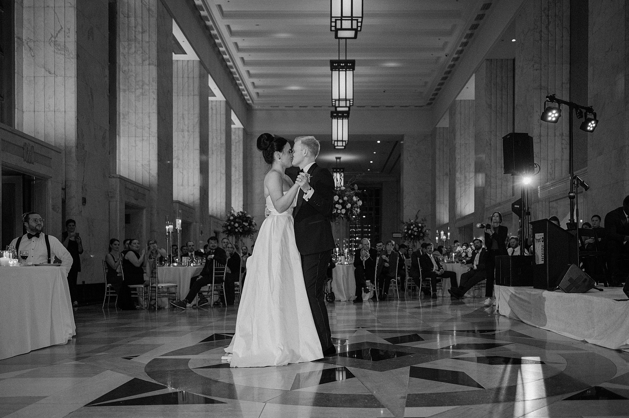 newlyweds share their first dance by Midwest wedding photographer