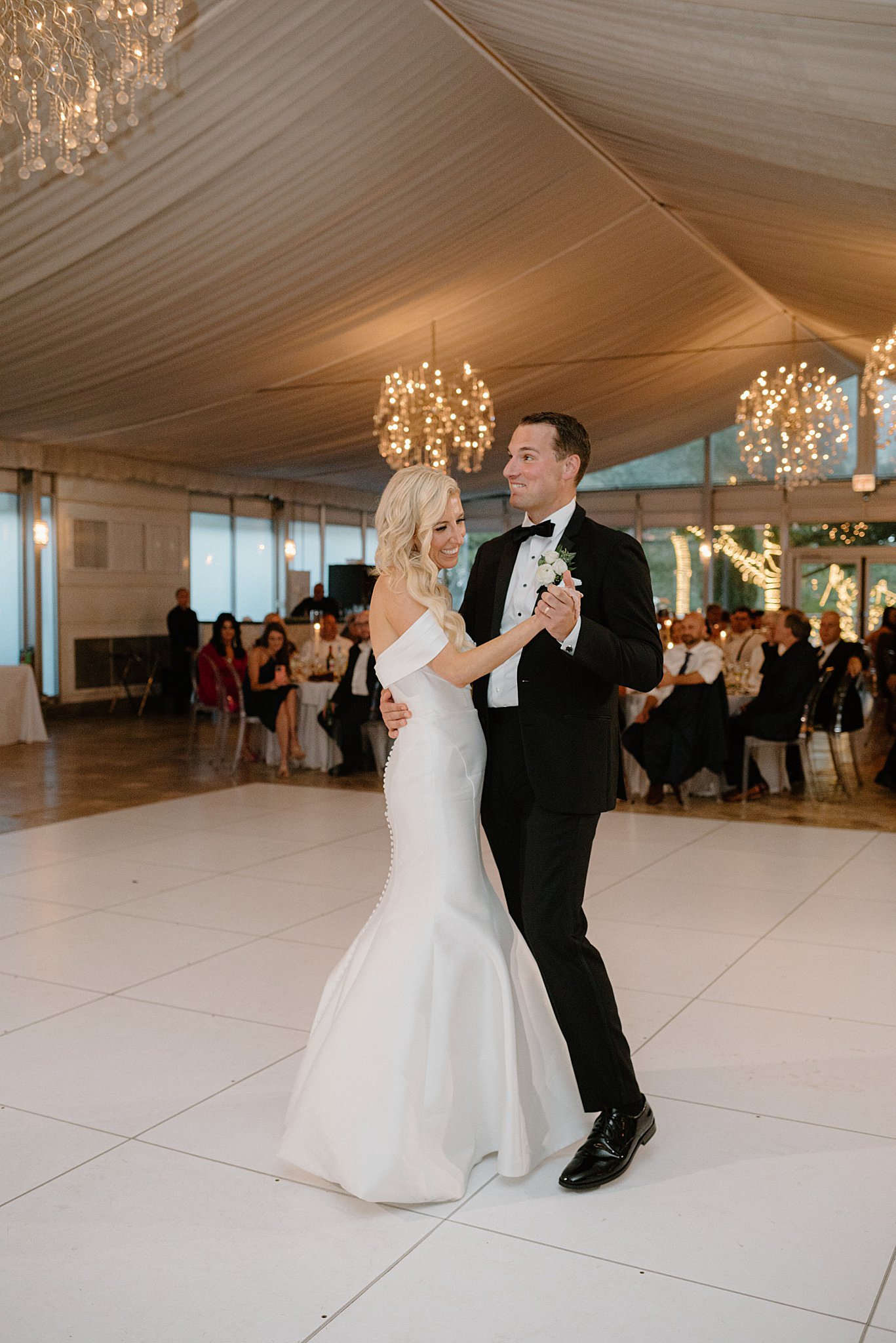 couple shares first dance as husband and wife by Midwest wedding photographer